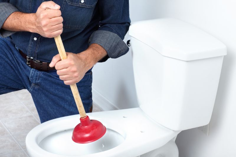 plumber-near-me-with-a-plunger-min